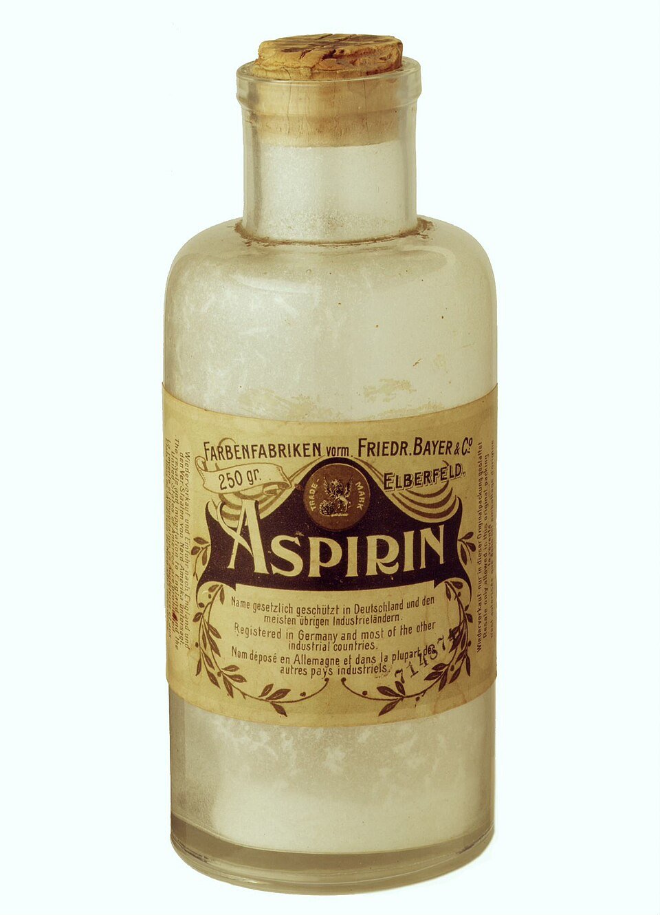 An early Bayer Aspirin bottle: paper label, cork stopper